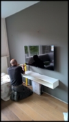 TV ophangen aan de muur